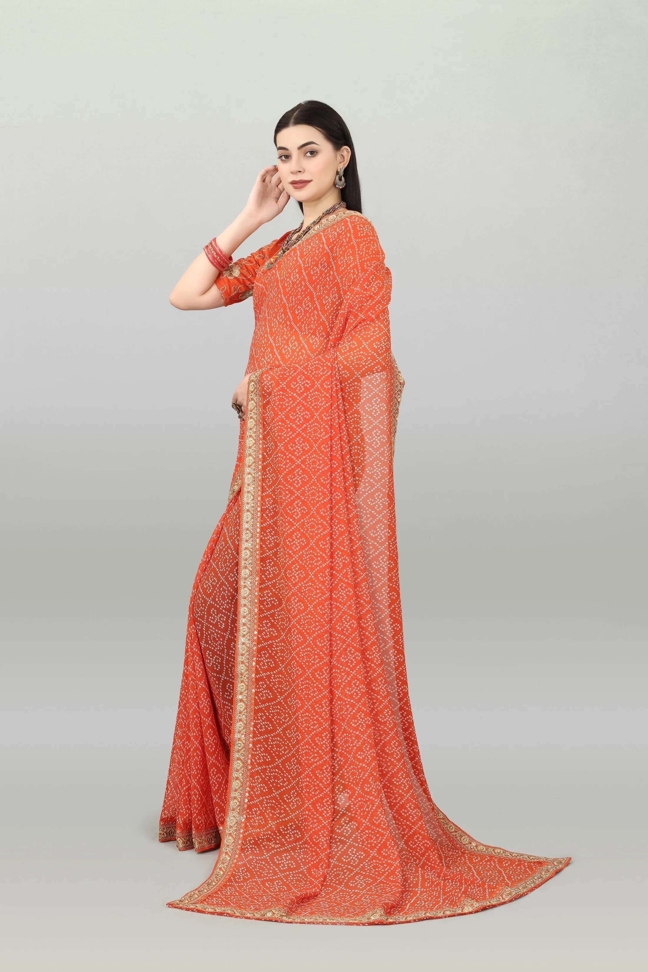 Women Party Wear Bandhani Printed Orange Colour Georgette Saree Collection